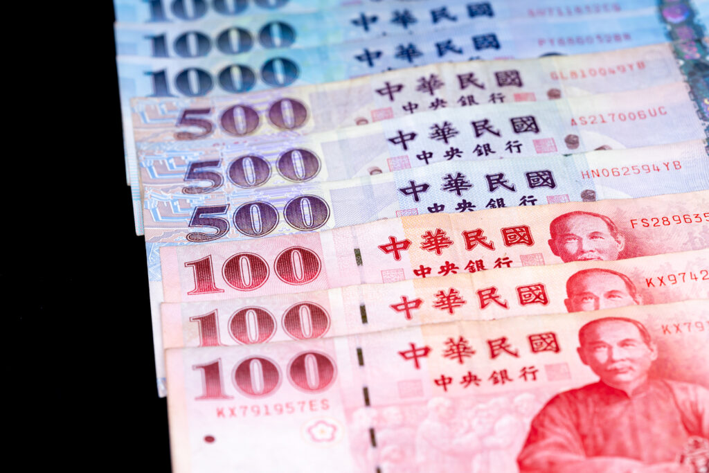 New taiwan dollar banknote, cash isolated on balck backbround