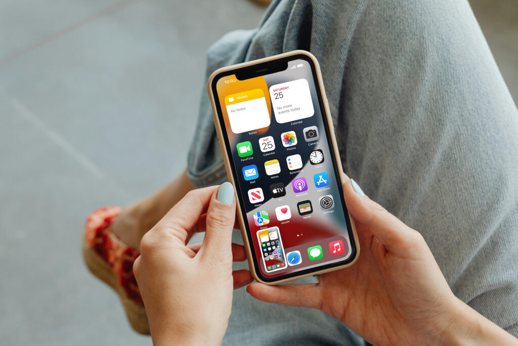 Person is holding iphone ui branding mockup