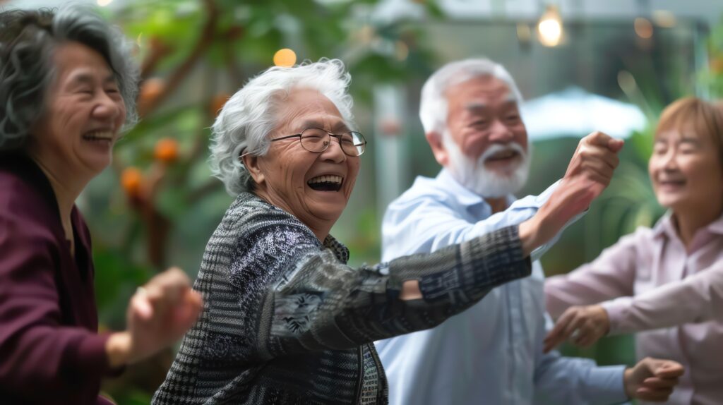 A group of elderly people are dancing and having fun in a retirement home.