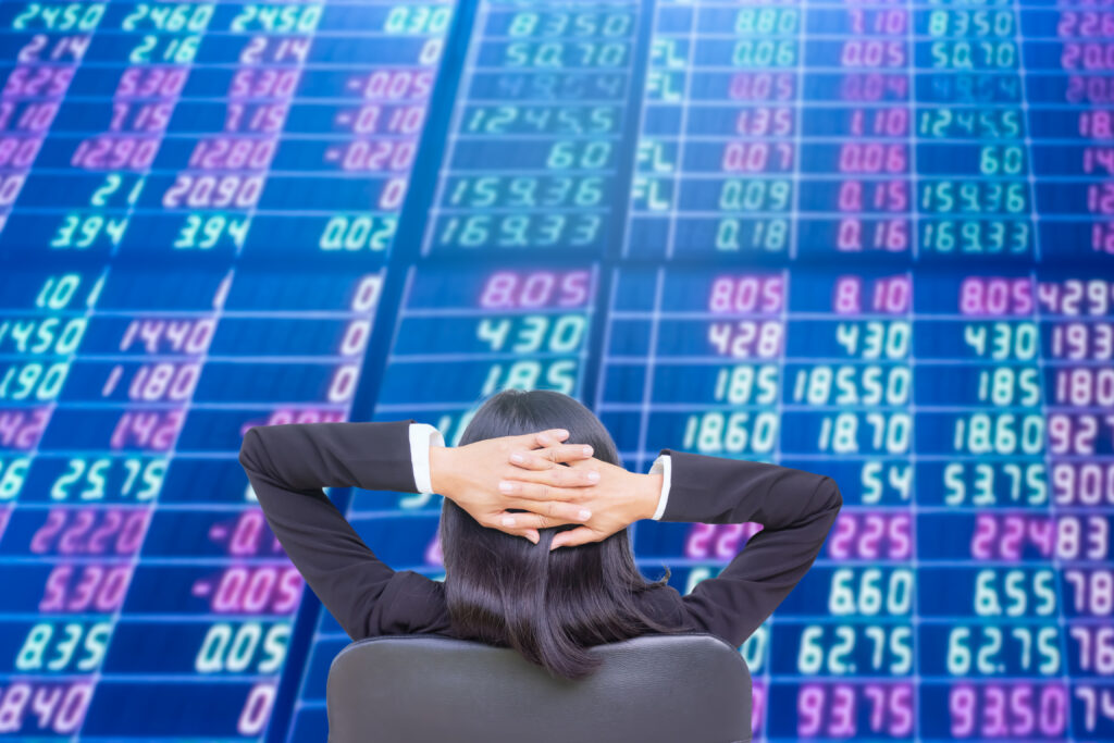 Staff woman with black suit blur numeric data stock market trader information currency forex rate analysis point profit plan income money future business finance technology concept