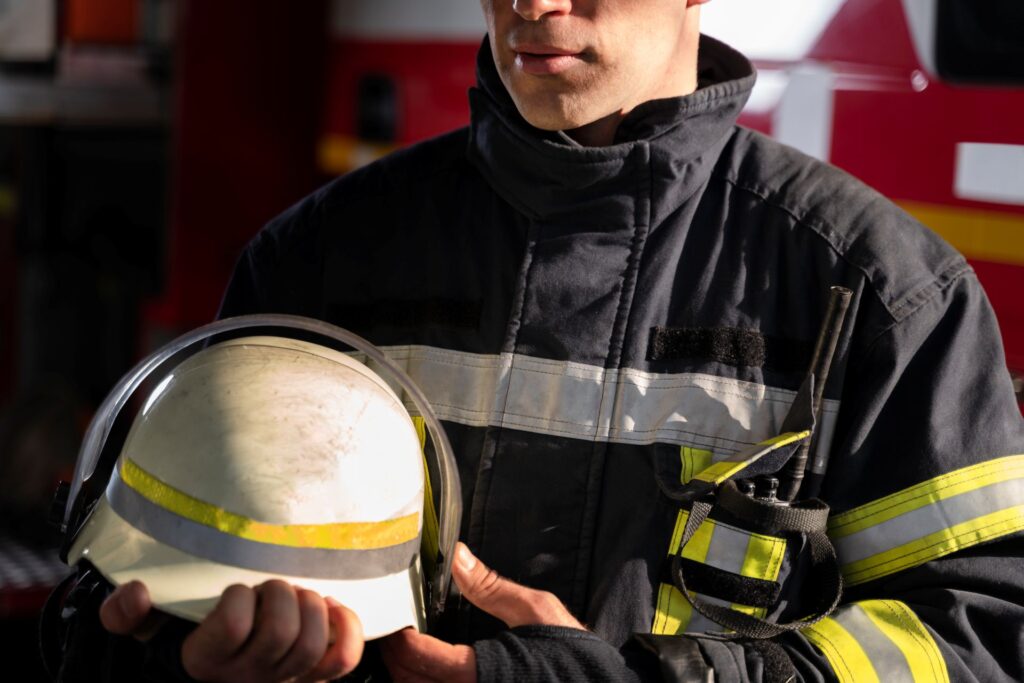 Male firefighter station with suit safety helmet