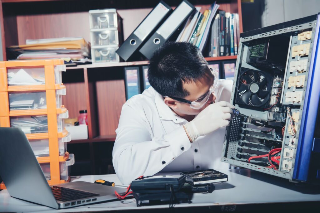 Technician repairing computer computer hardware repairing upgrade technology